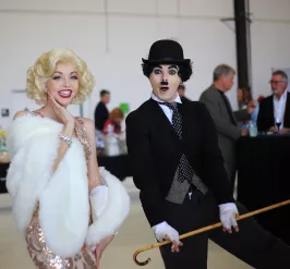 A couple dressed as Marylin Monroe and Charlie Chaplin. 
